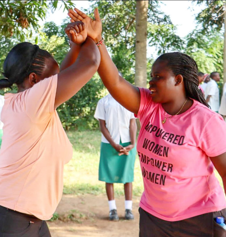 Young women learning self defence